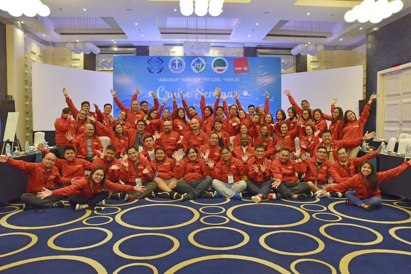 Group photo from cruise seminar in Philippines. Everyone wearing red t-shirts